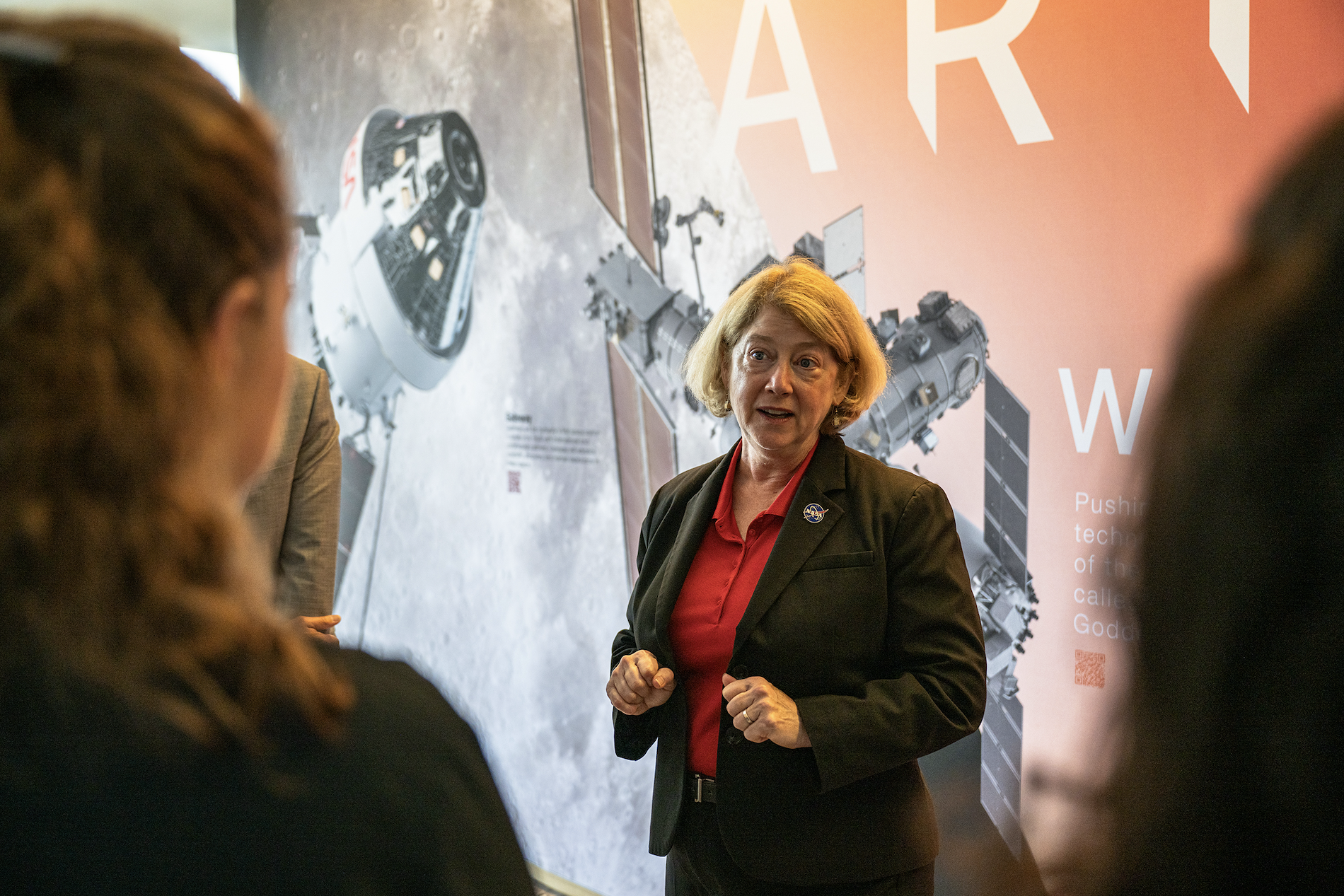 NASA Deputy Administrator Pam Melroy speaks with NASA 2040 participants in the lobby of N232, during her visit to Ames on Sept. 16.